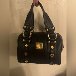 MCM Grained calfskin studded Boston bag.